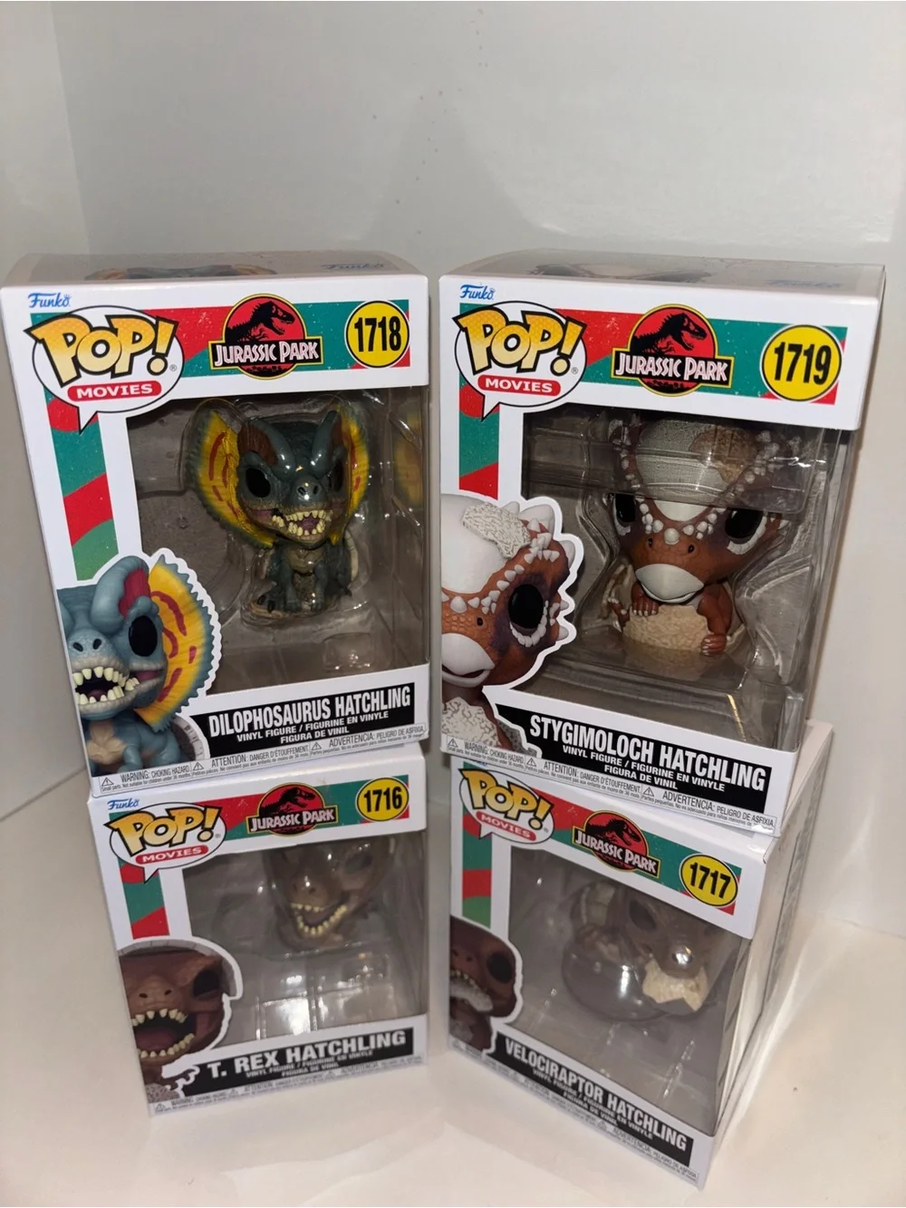Funko Jurassic Park Hatchling 4-Pack Vinyl Figures - Green, Brown, Tan, Gray